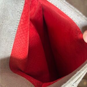 Hammit Crossbody in very good condition with Red suede interior.